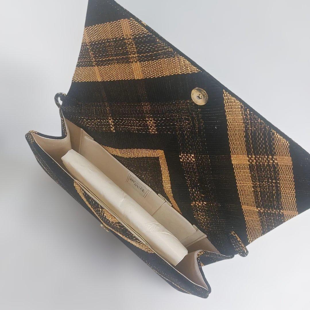 MIKIMOTO 黒と金のチェック柄クラッチバッグ 新品　値段を下げました。