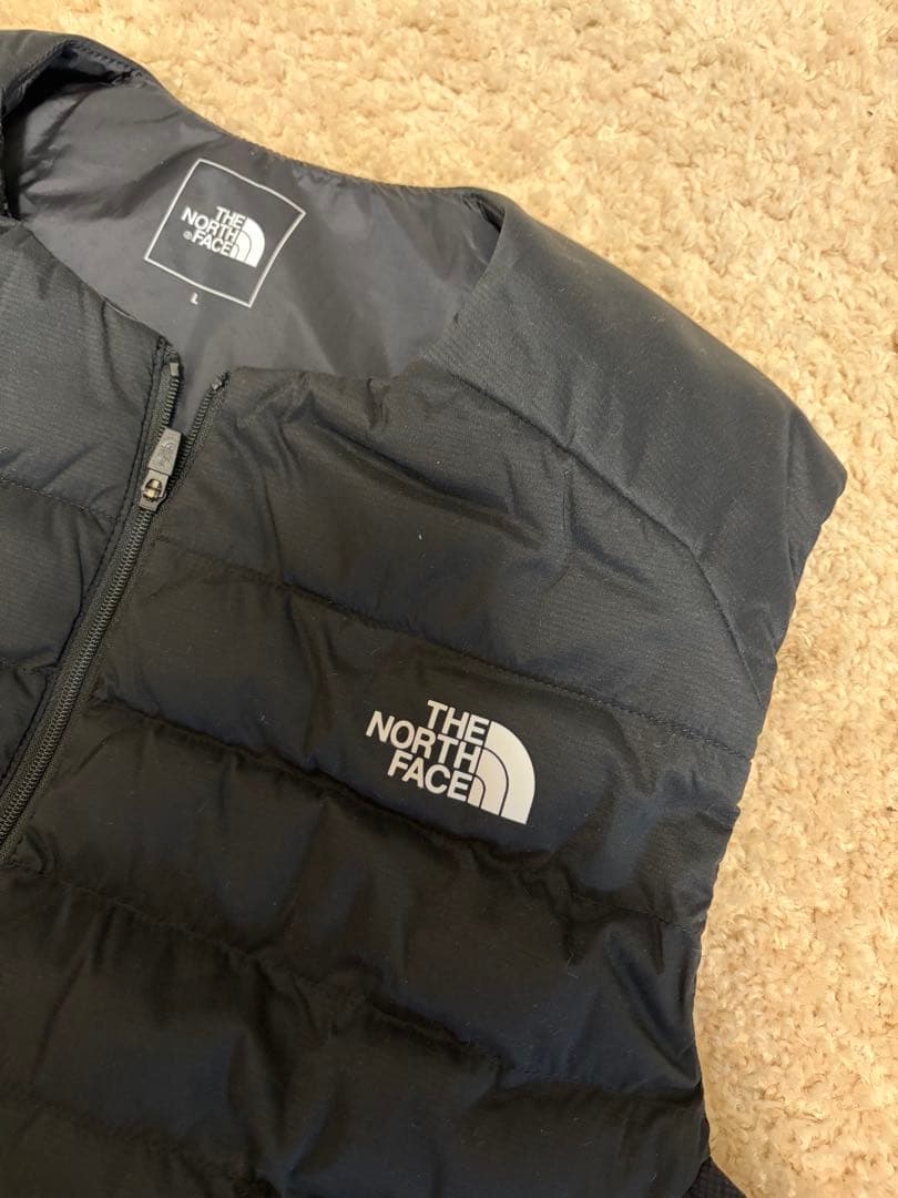 ノースフェイス　2024年レッドランベストレディースNYW82494 Lサイズ