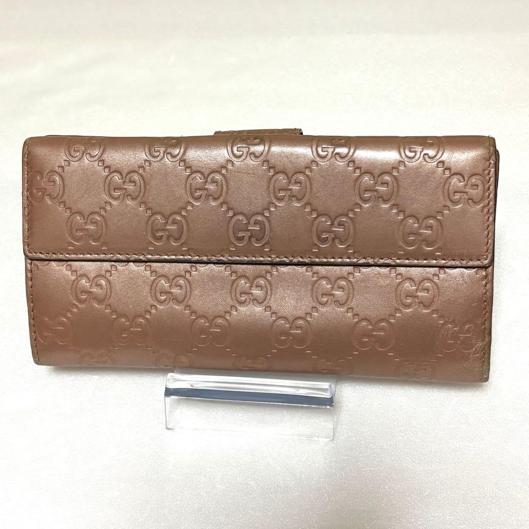 【大人お洒落】グッチ 長財布 シマレザー ハート金具 GG柄 ブロンズ