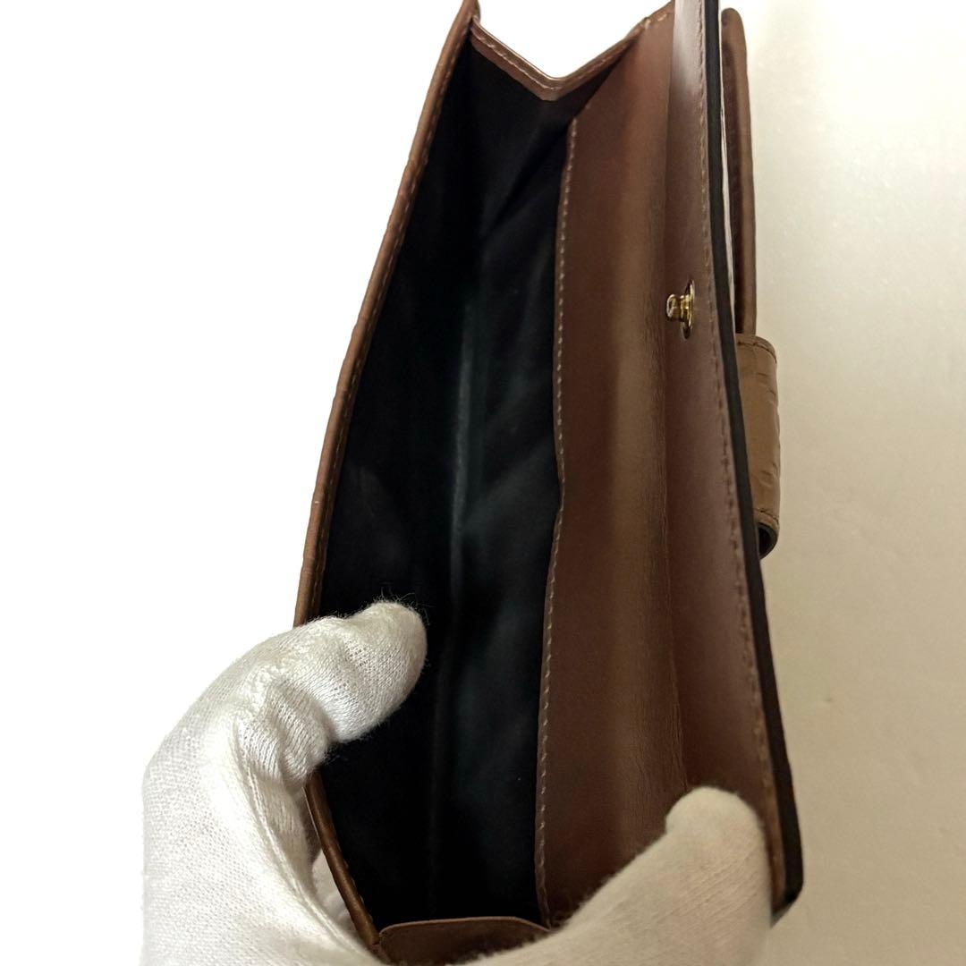 【大人お洒落】グッチ 長財布 シマレザー ハート金具 GG柄 ブロンズ