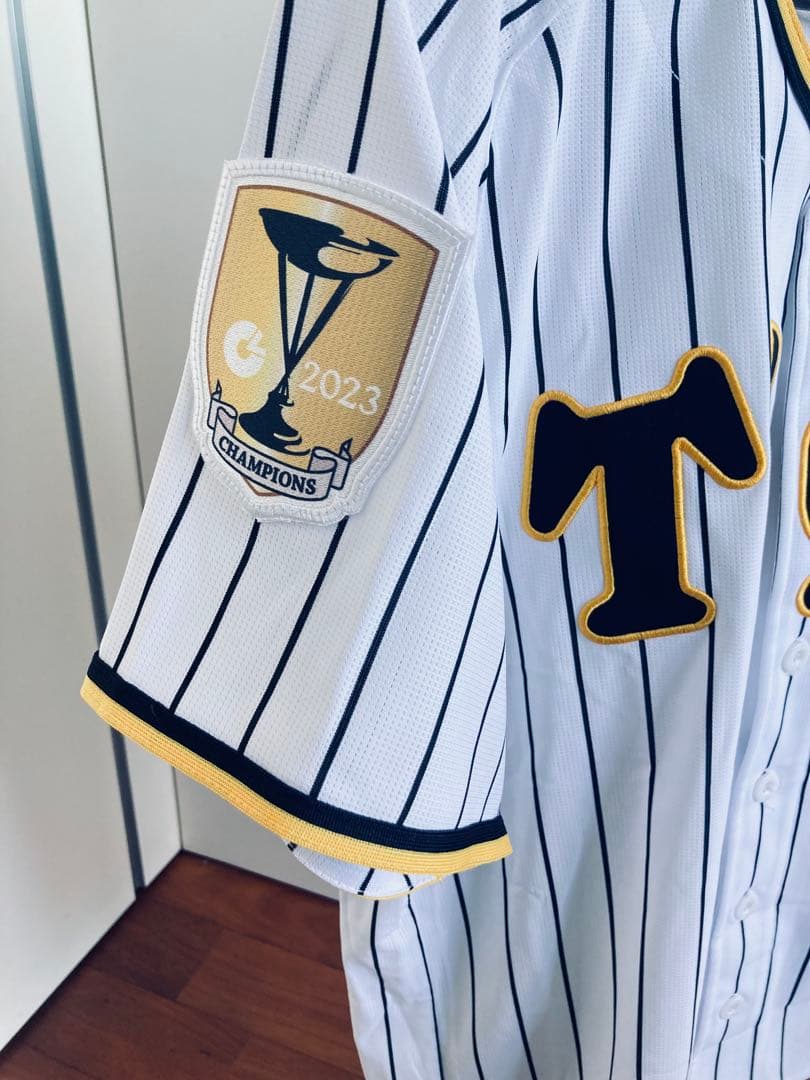 ミズノ　S 阪神タイガース　佐藤輝明　チャンピオンエンブレム付き　ユニフォーム