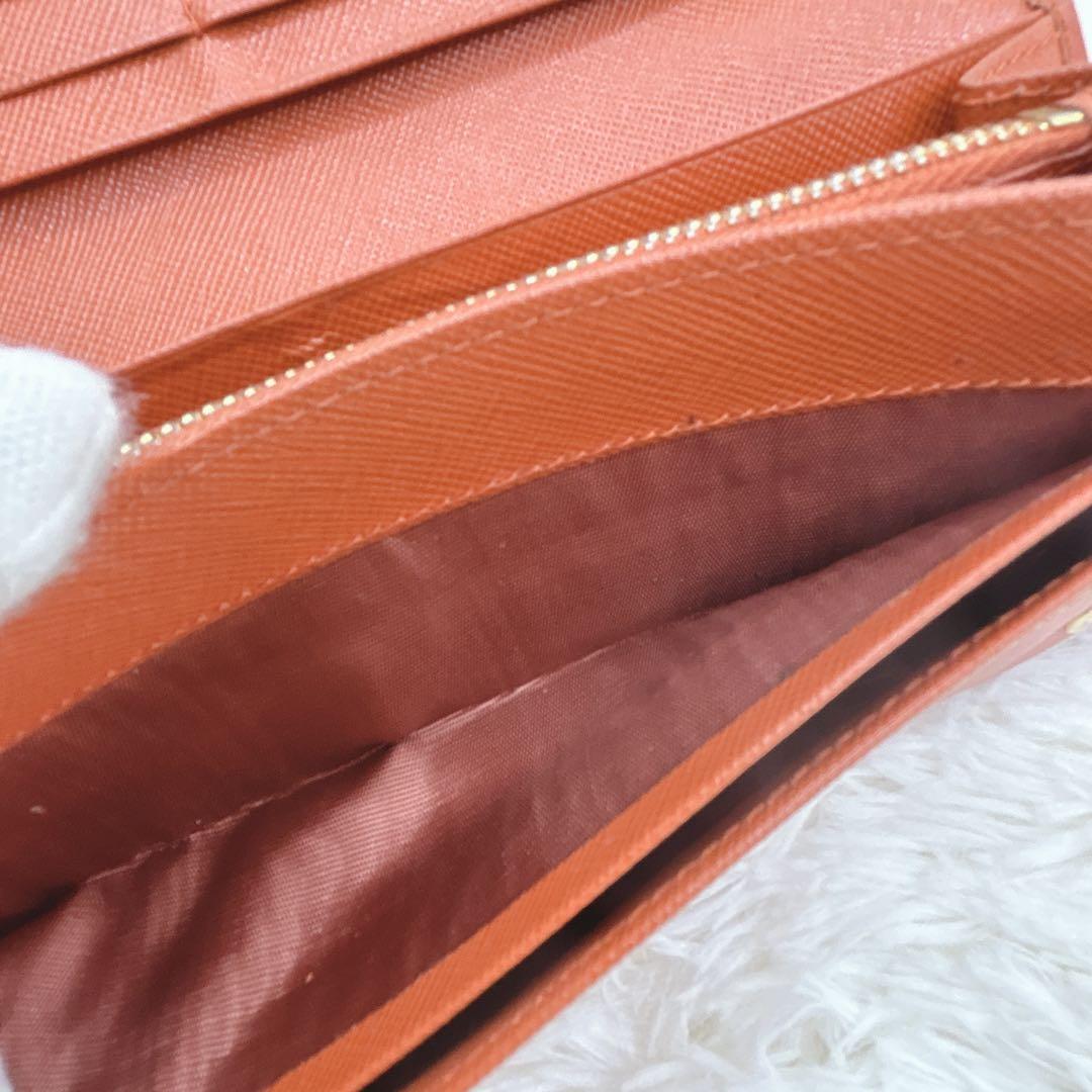 プラダ 長財布 サフィアーノ フィオッコ レッド メタルロゴ リボン