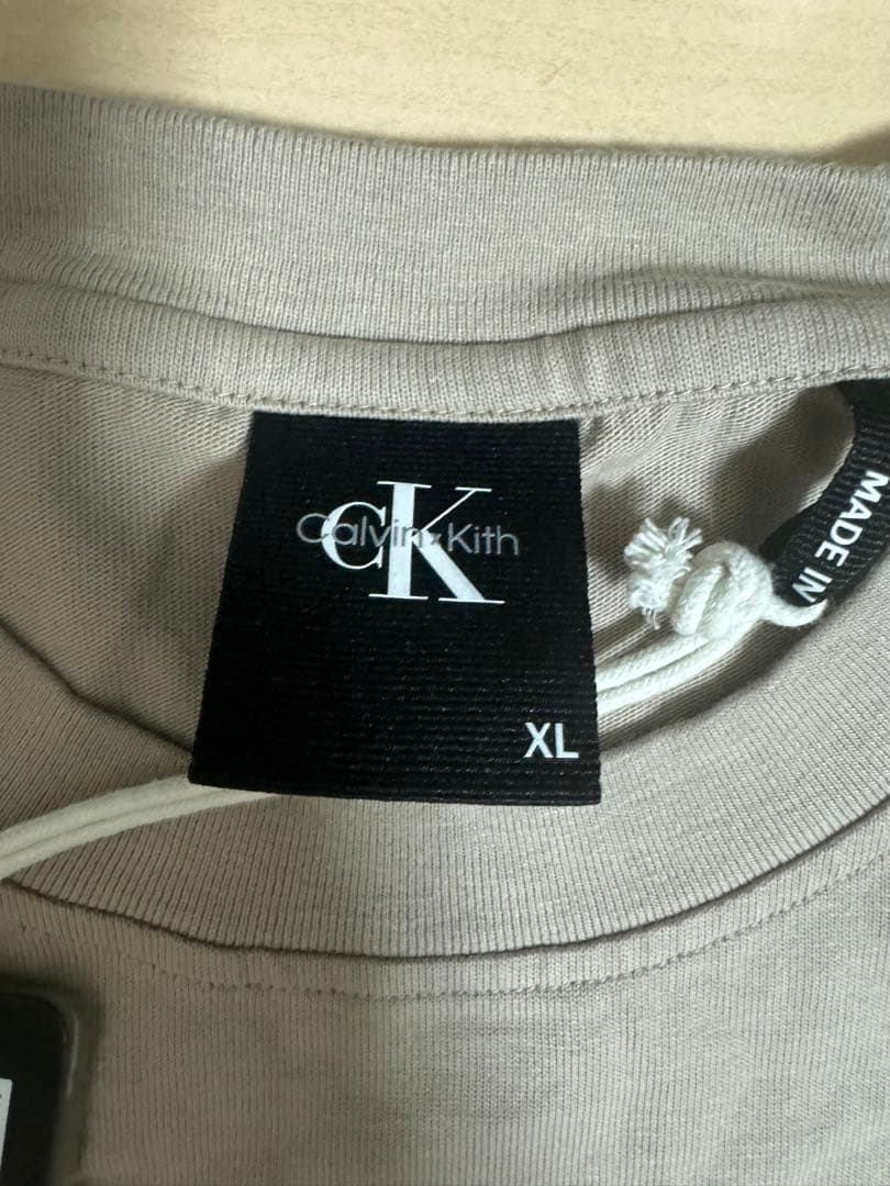  Kith ベージュ ロンT