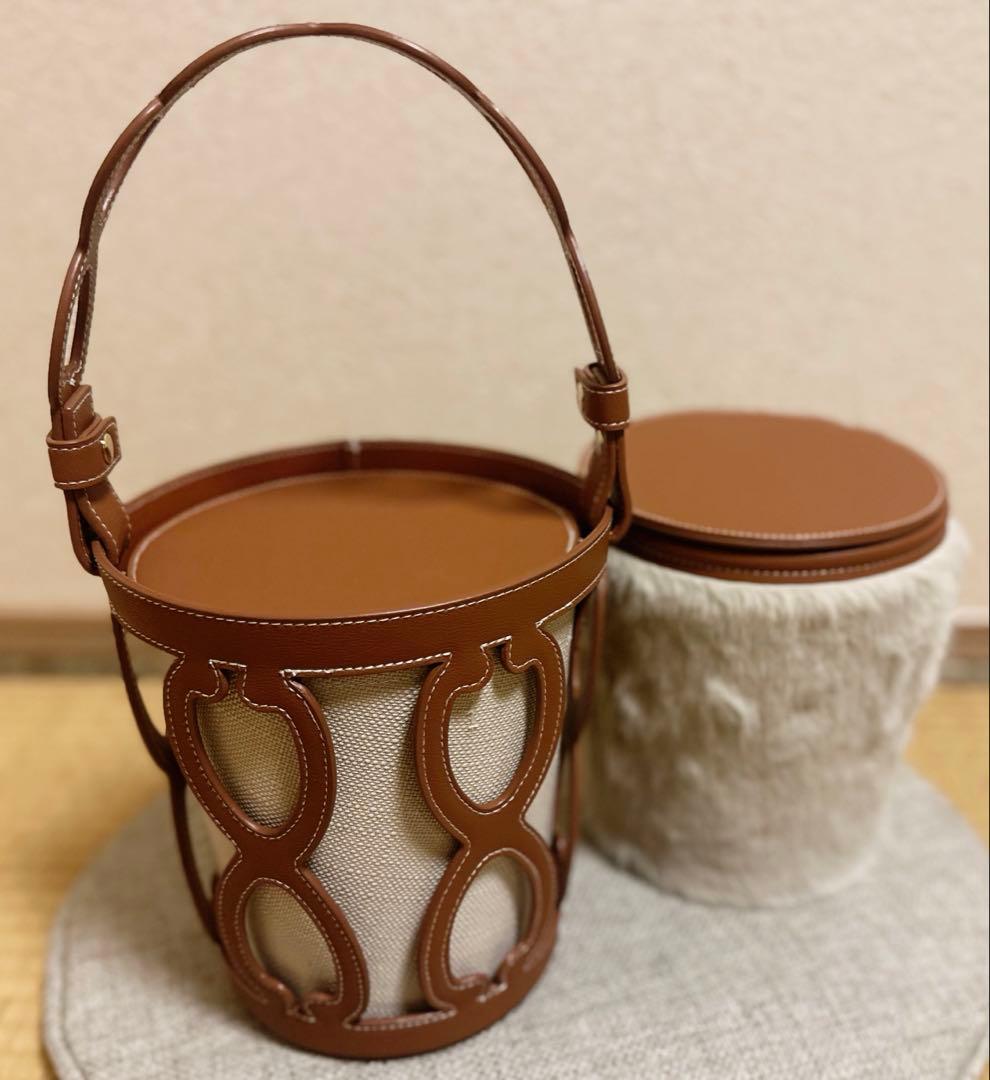 セブンテン　カットワークレザーバケットバッグ