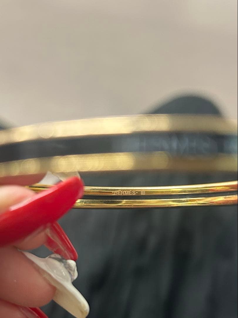 HERMÈS ゴールド ブラック バングル　ユニ