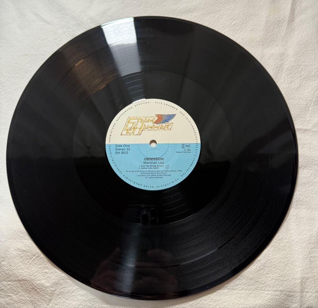 OBSESSION – Marshall Law LP