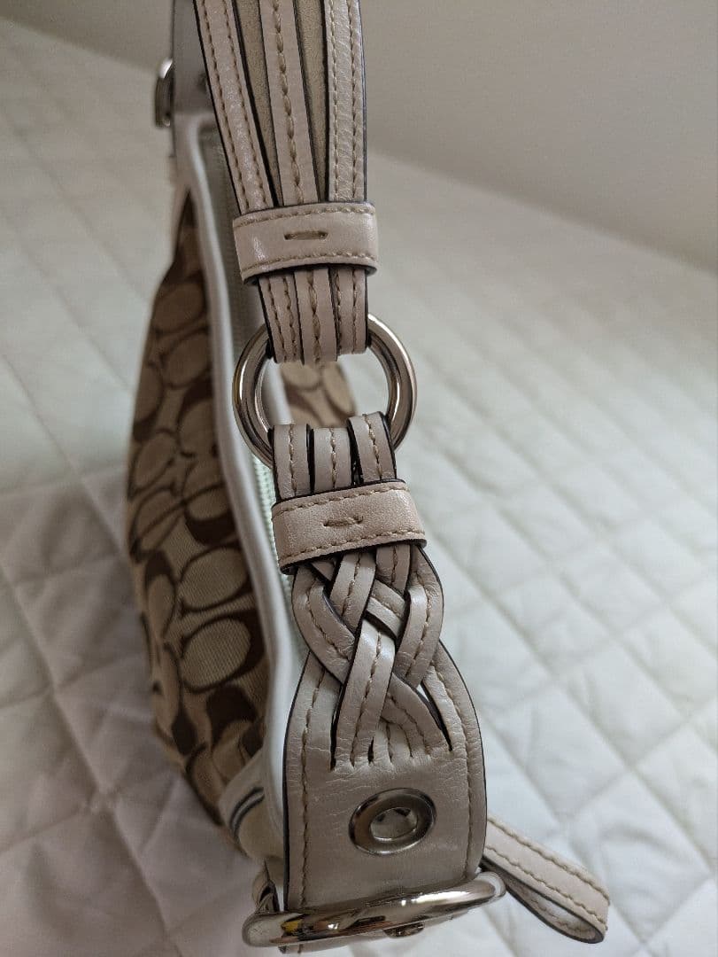 コーチcoach茶色シグネチャー模様キャンバス 半円形スモールホーボーバッグ