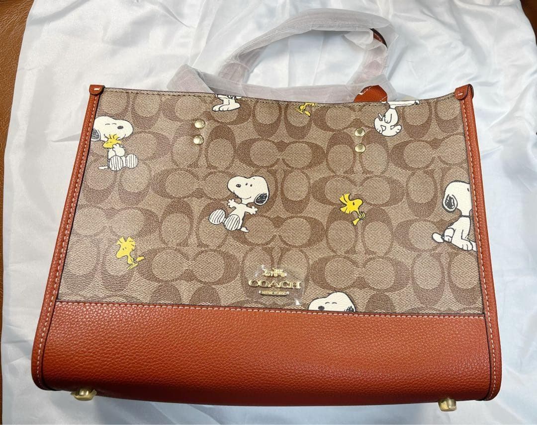 COACH X PEANUTS 新作 ウッドストック デンプシー トートバッグ