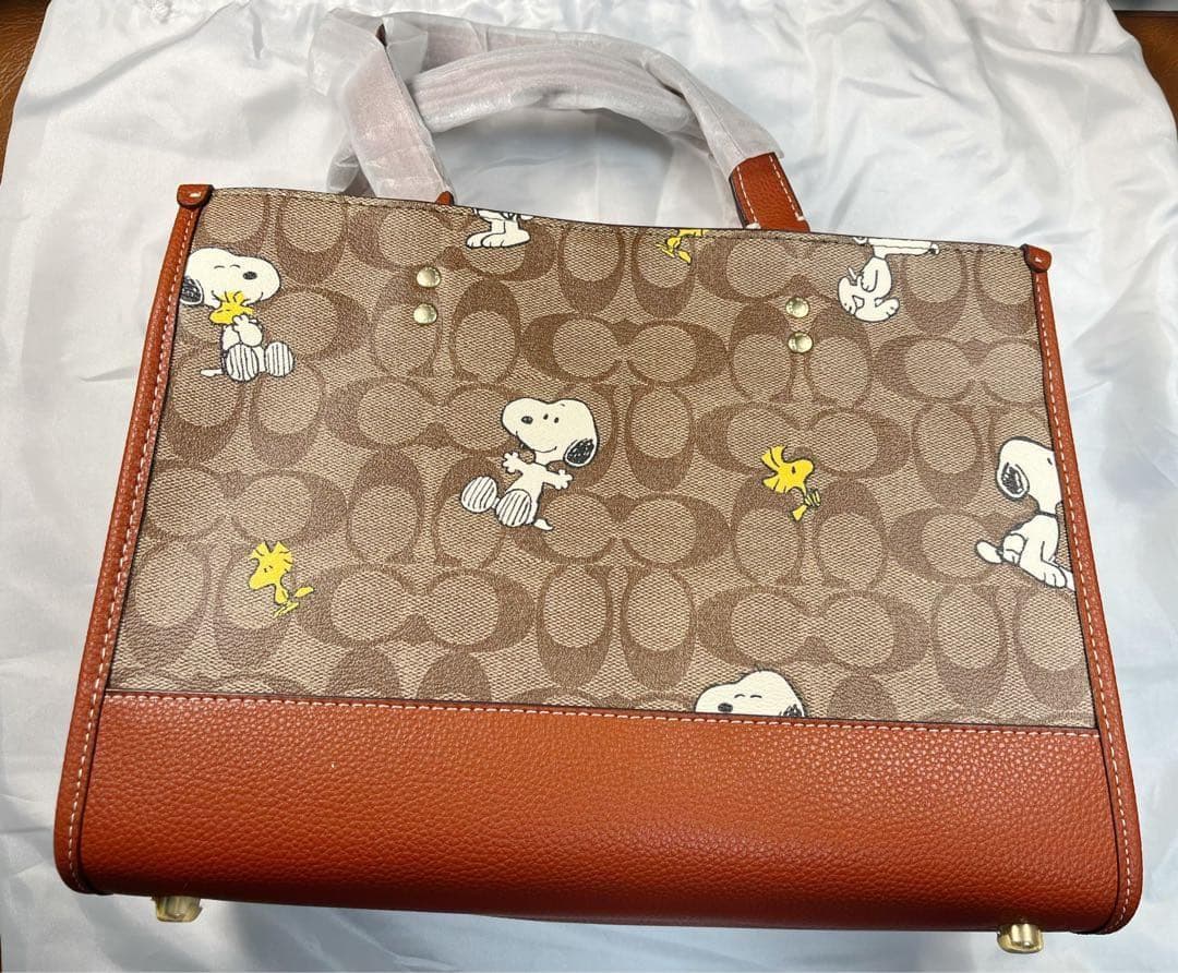 COACH X PEANUTS 新作 ウッドストック デンプシー トートバッグ