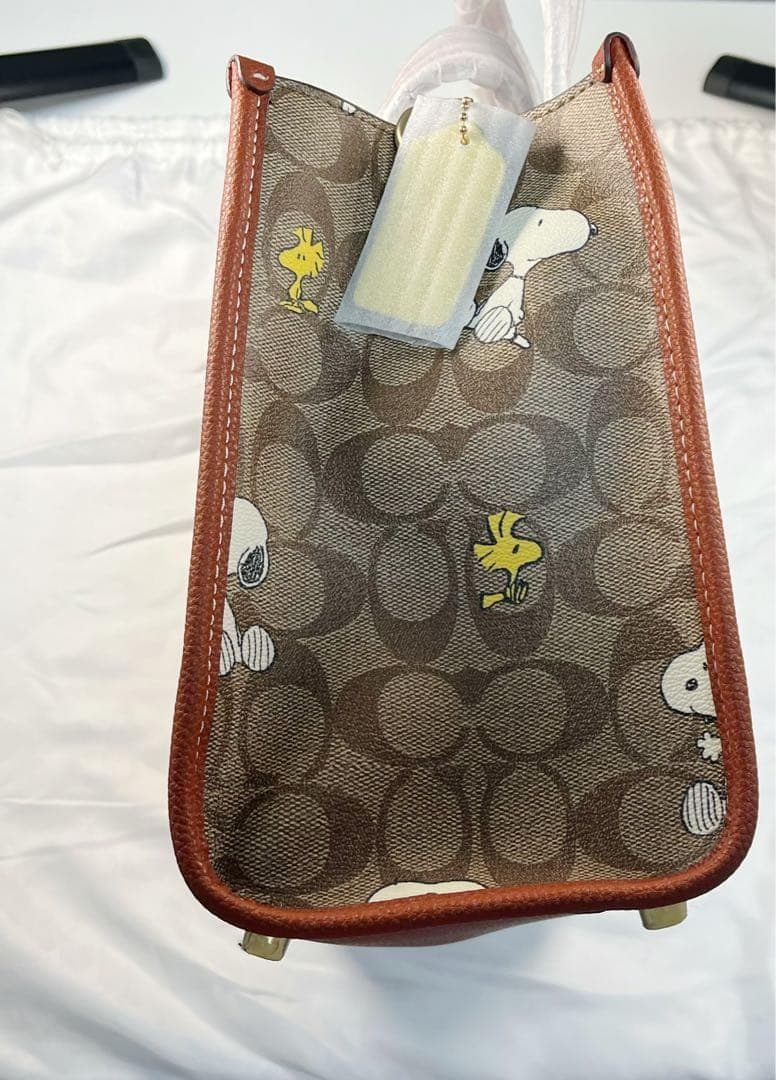 COACH X PEANUTS 新作 ウッドストック デンプシー トートバッグ