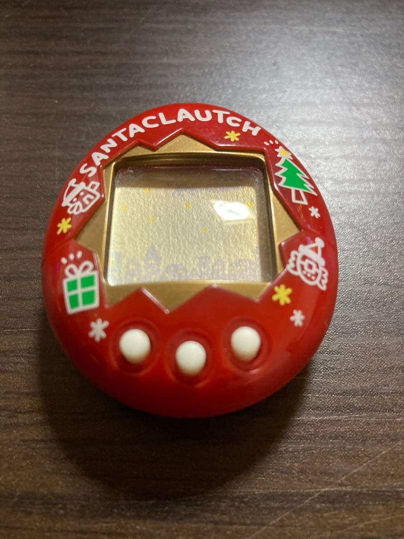 【動作確認済・ジャンク】サンタクロっちのたまごっち　レッド　※裏蓋両側ビス欠け