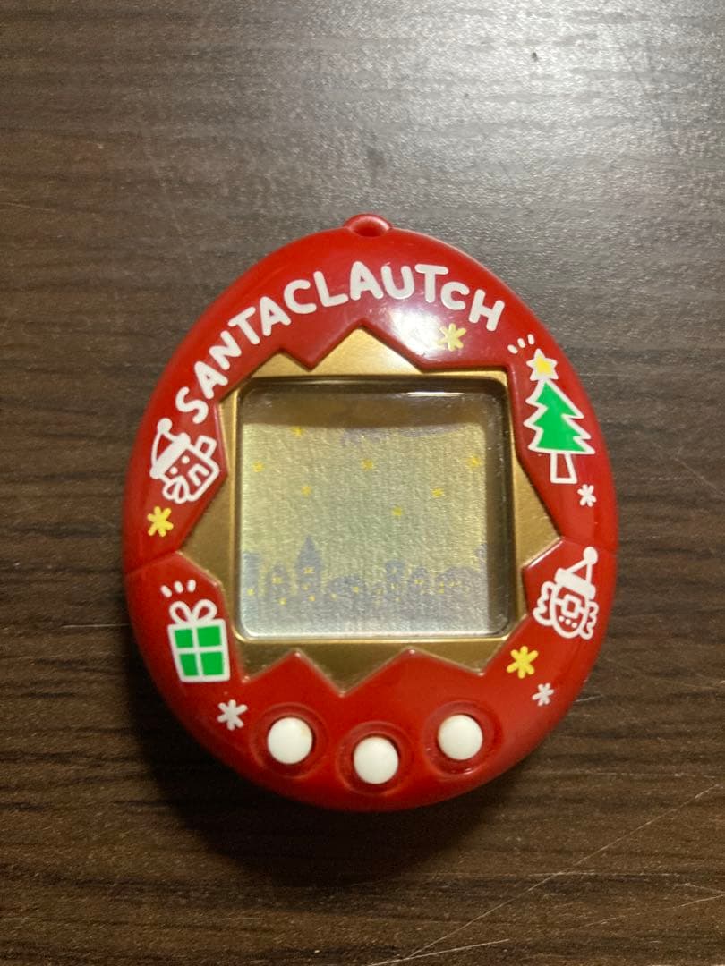 【動作確認済・ジャンク】サンタクロっちのたまごっち　レッド　※裏蓋両側ビス欠け