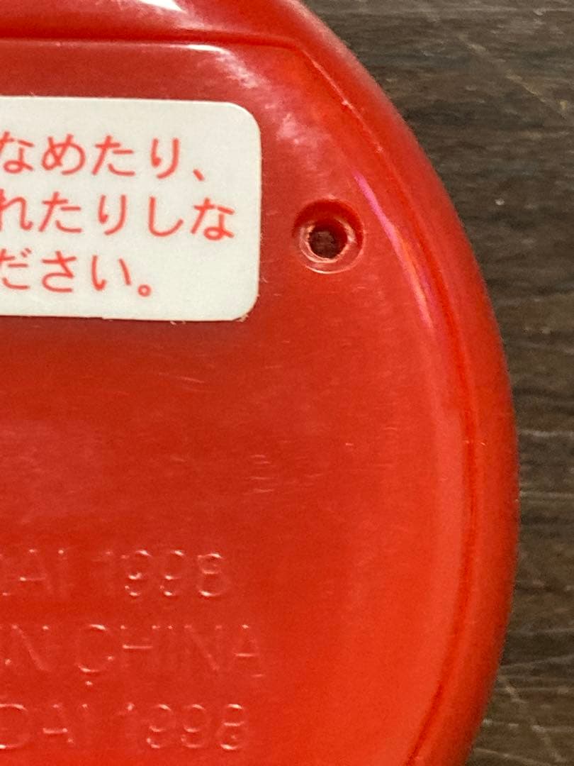 【動作確認済・ジャンク】サンタクロっちのたまごっち　レッド　※裏蓋両側ビス欠け