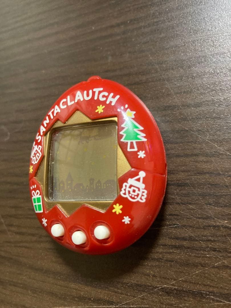 【動作確認済・ジャンク】サンタクロっちのたまごっち　レッド　※裏蓋両側ビス欠け