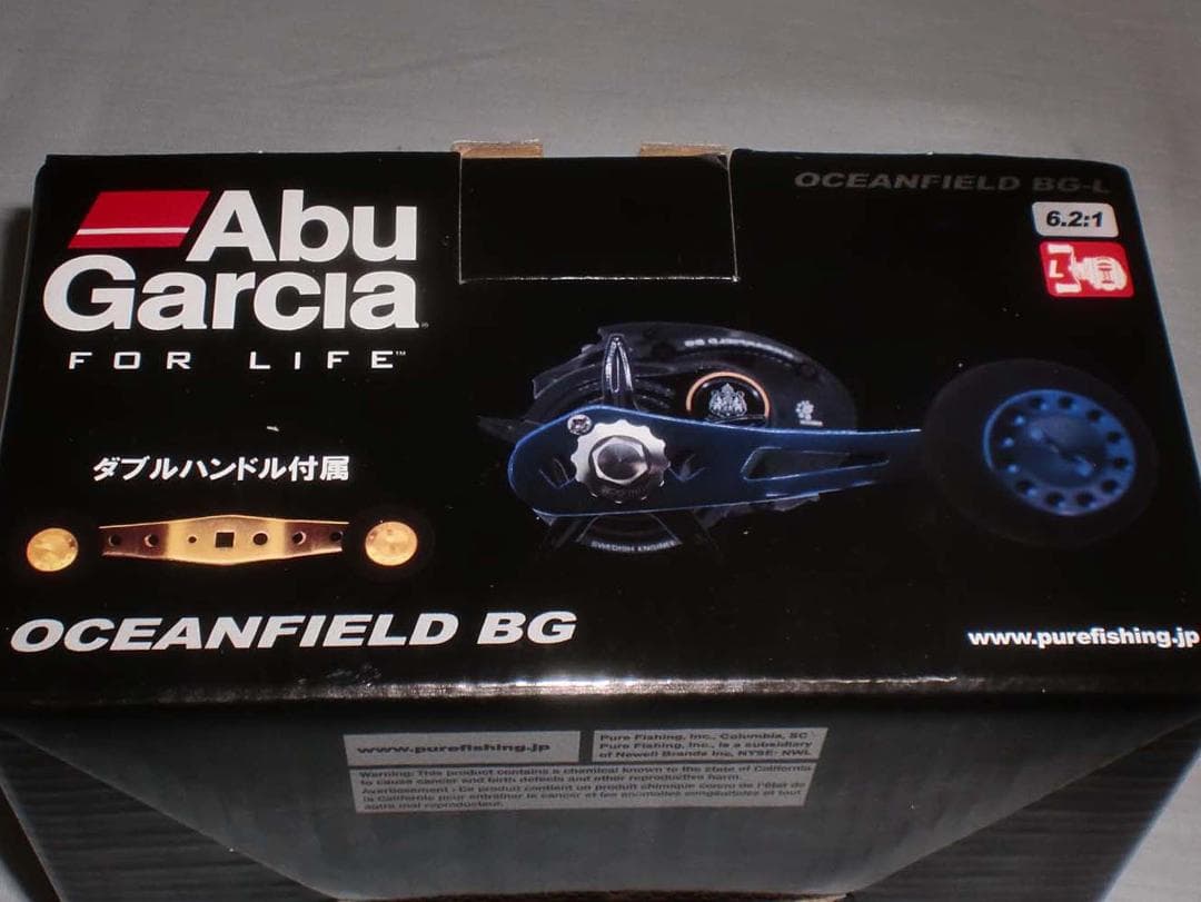 Ａｂｕ　オーシャンフィールドＢＧ＜左巻＞スペアハンドル付　新品（※箱折り目有り）