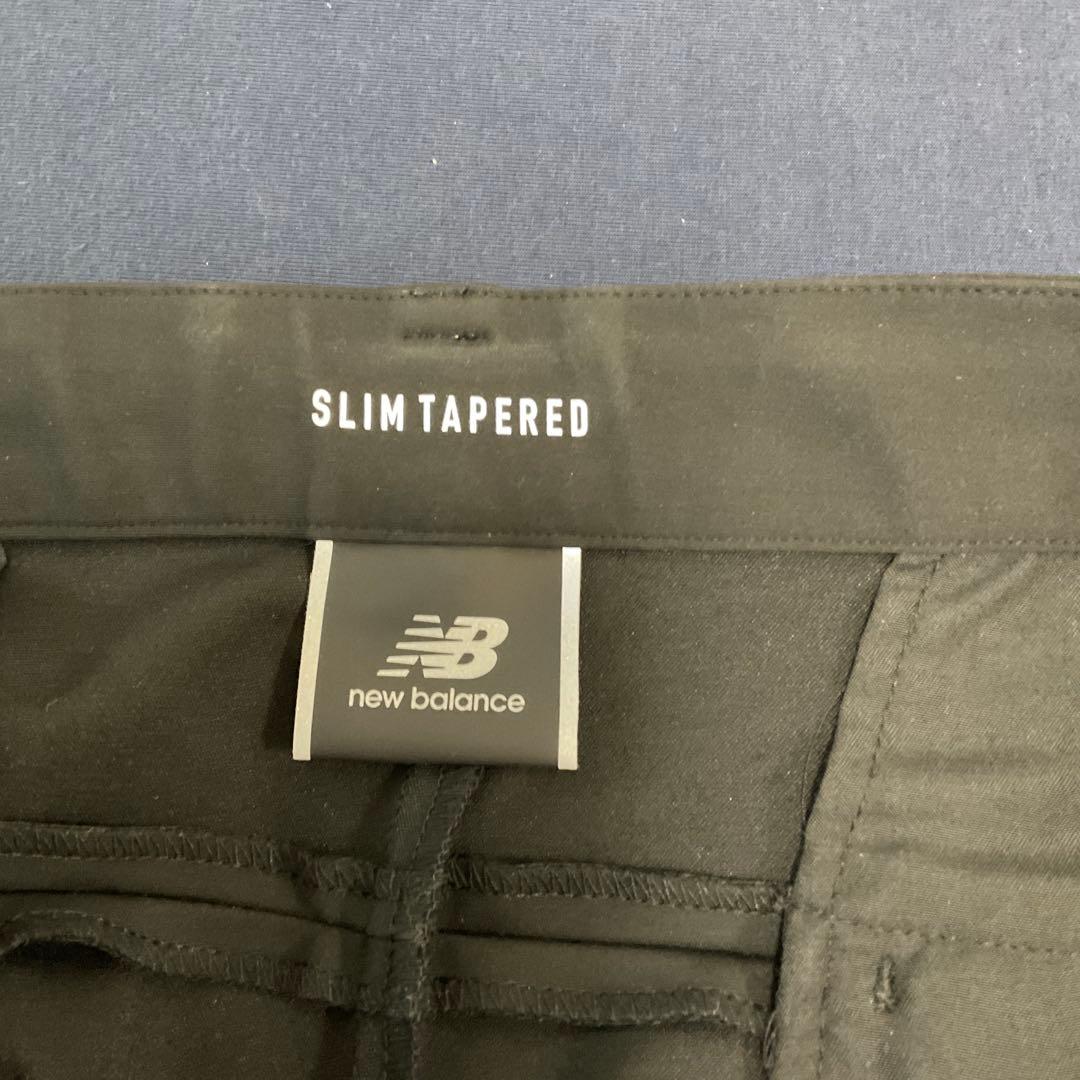 new balance ブラックスーツ　used 上下XLサイズ