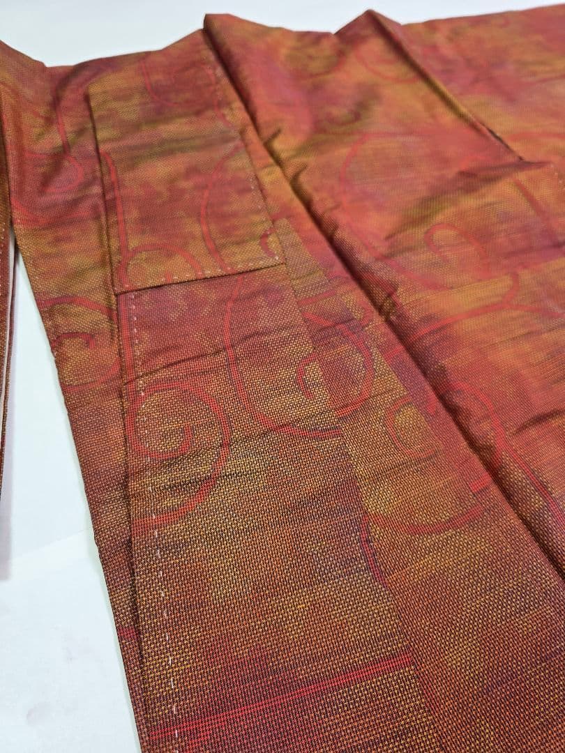 【七代目 都喜ヱ門】【手絣】未使用品 藤絹織物 大島紬 一元式 証紙 躾付き