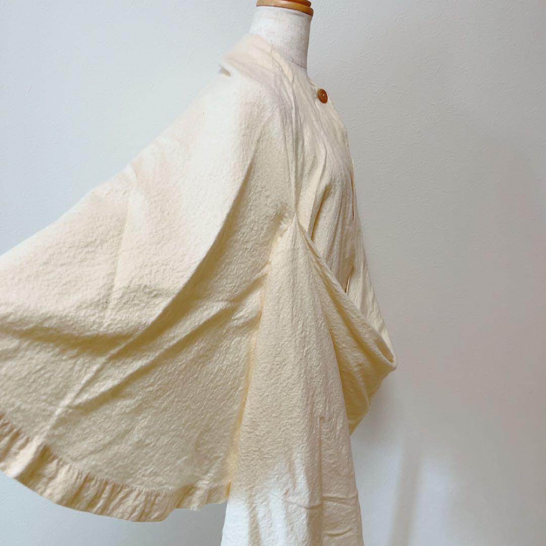 コズミックワンダー ライトソース 圧縮コットンポンチョマントコート オフホワイト