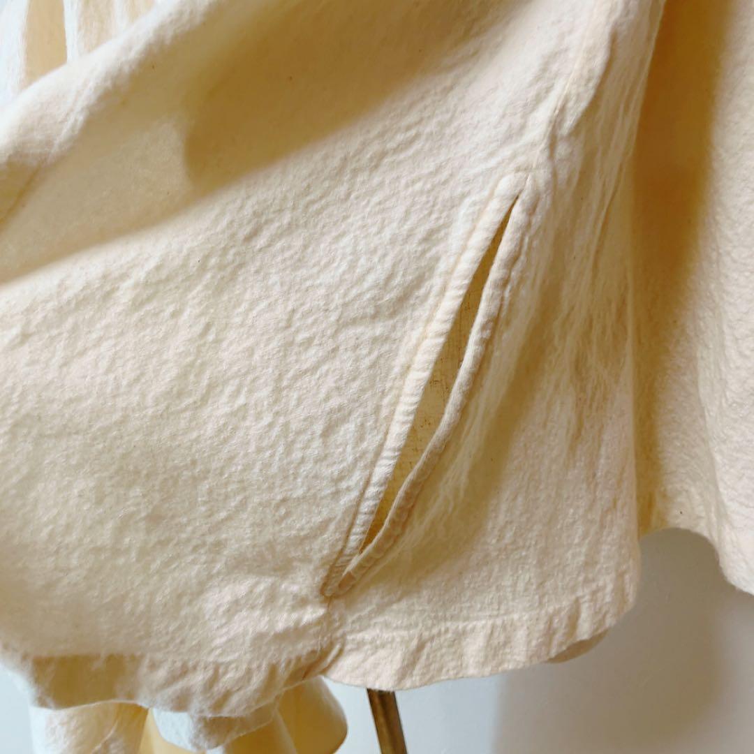 コズミックワンダー ライトソース 圧縮コットンポンチョマントコート オフホワイト