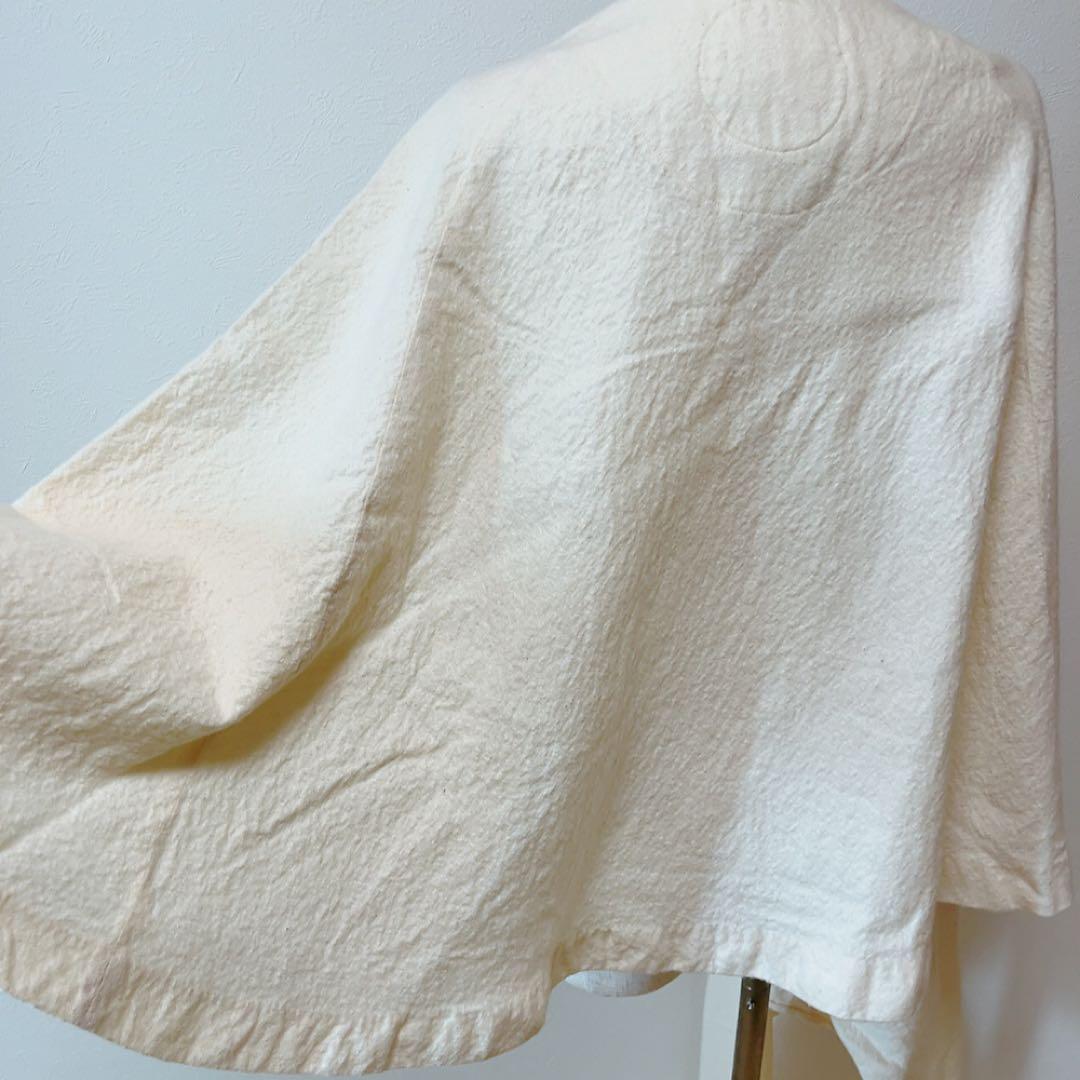 コズミックワンダー ライトソース 圧縮コットンポンチョマントコート オフホワイト