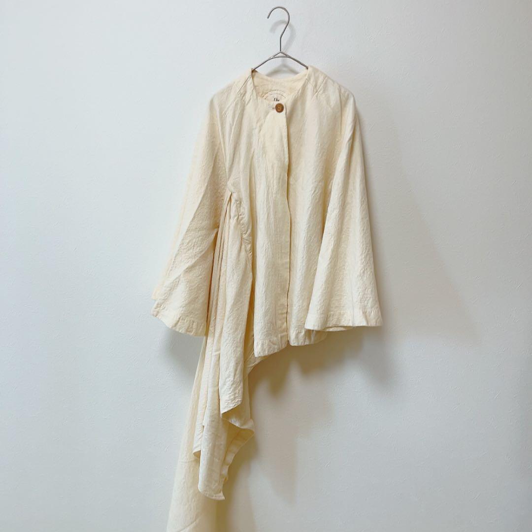 コズミックワンダー ライトソース 圧縮コットンポンチョマントコート オフホワイト