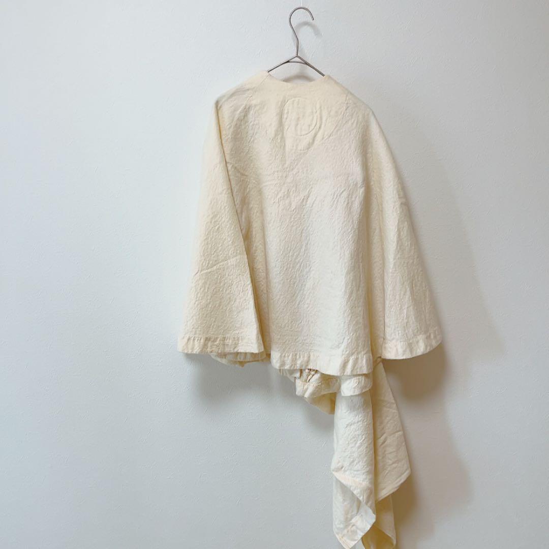 コズミックワンダー ライトソース 圧縮コットンポンチョマントコート オフホワイト