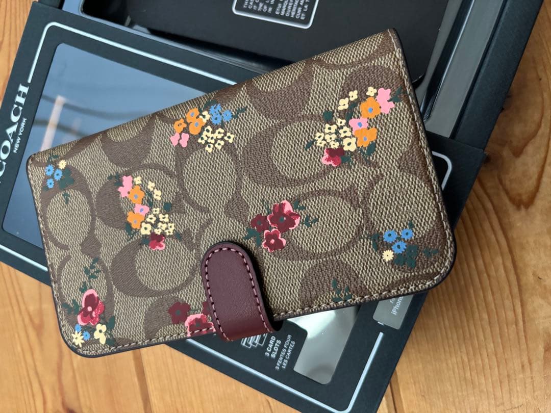新品 coach スマホケース フラワー iPhone14Pro