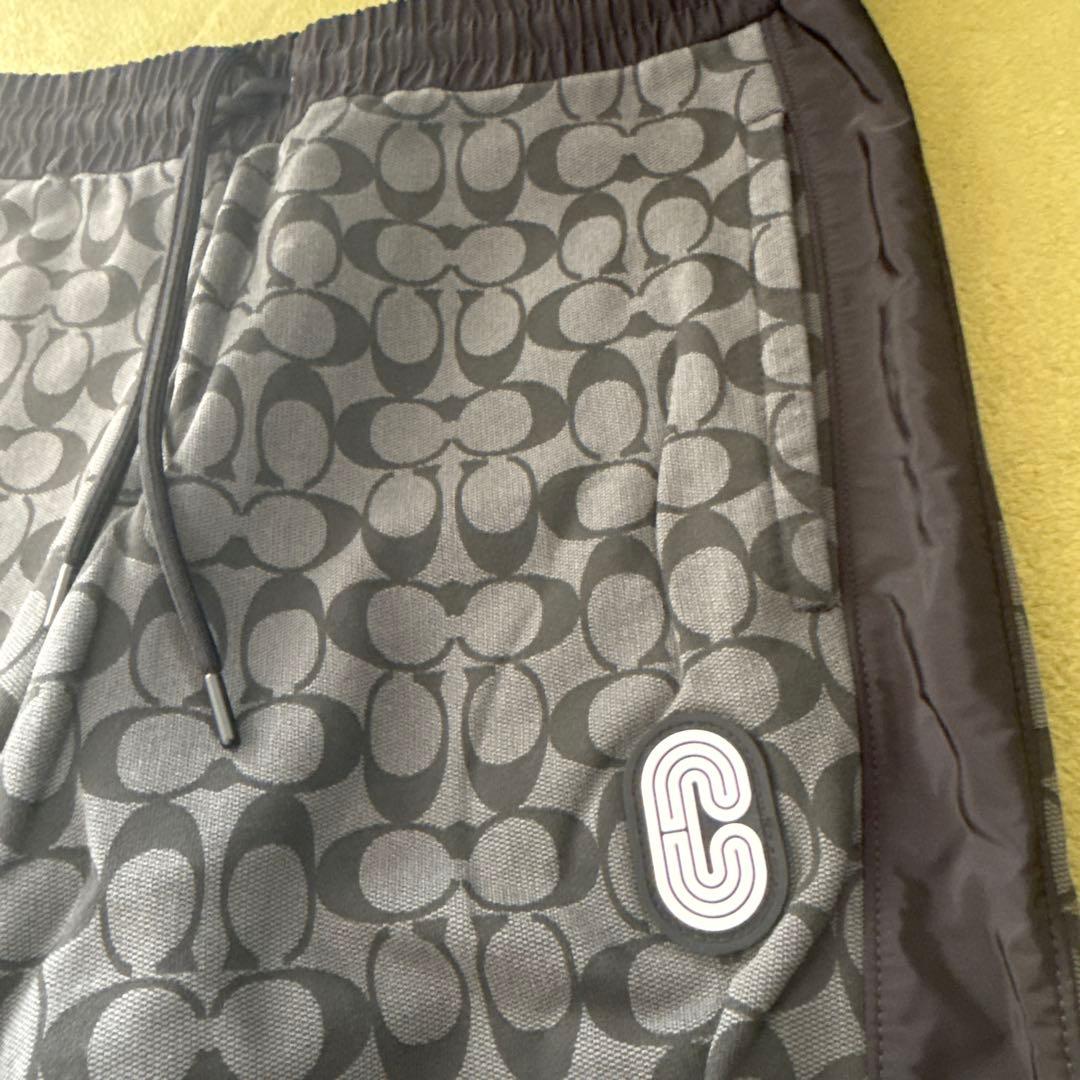 Coach コーチメンズ総柄グレースウェットパンツ　L