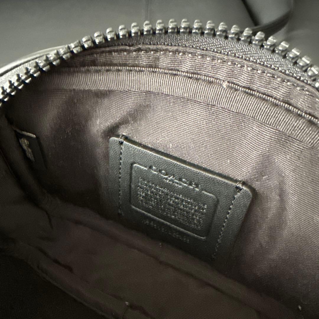 COACH ダブルジッパーバッグ オレンジ/黒