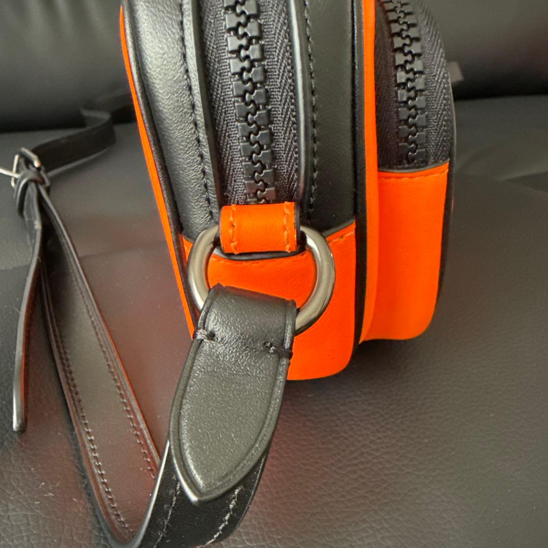 COACH ダブルジッパーバッグ オレンジ/黒