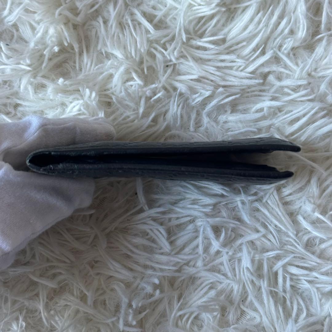 グッチ GGシマ 二つ折り財布 型押し レザー コンパクト 黒 総柄 エンボス