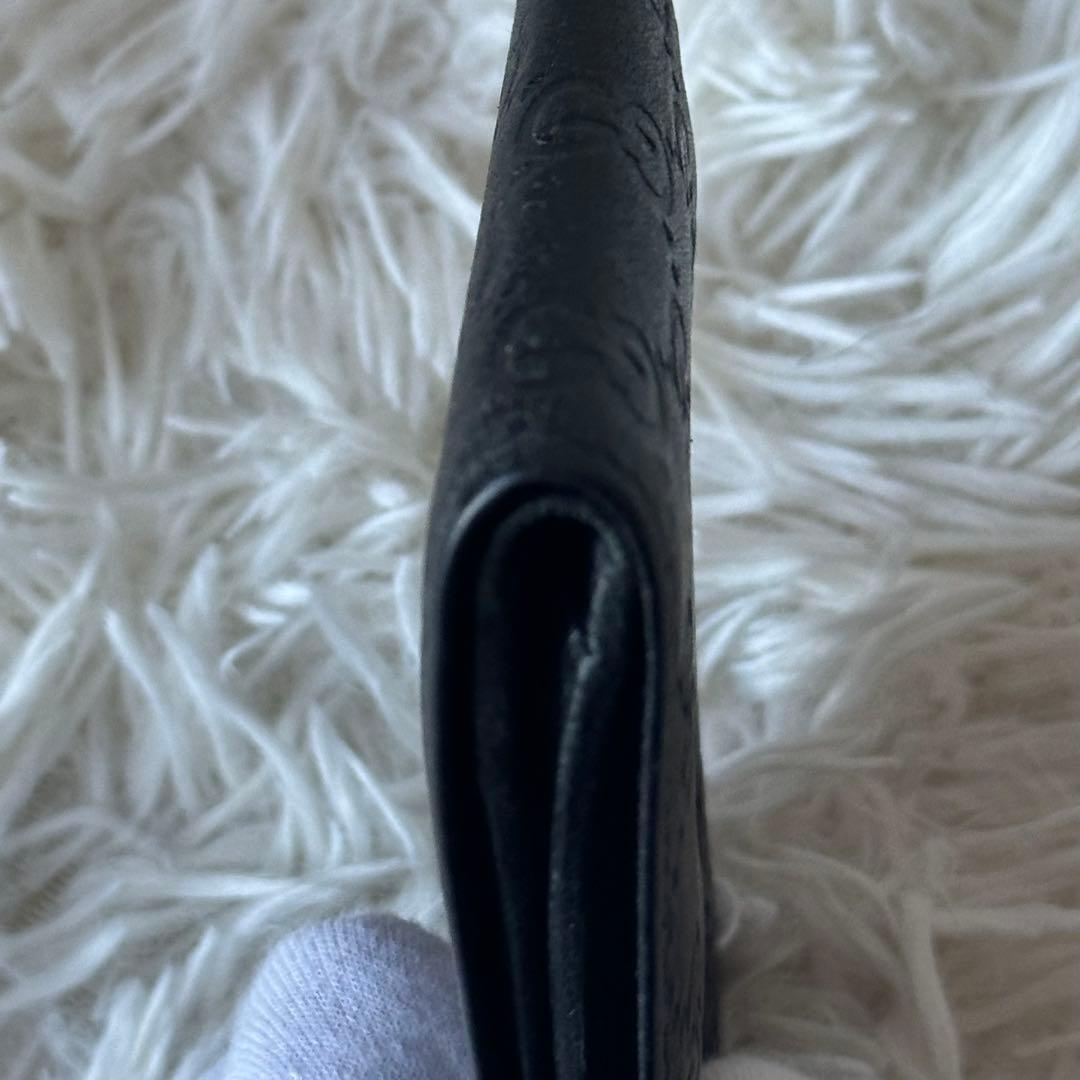 グッチ GGシマ 二つ折り財布 型押し レザー コンパクト 黒 総柄 エンボス