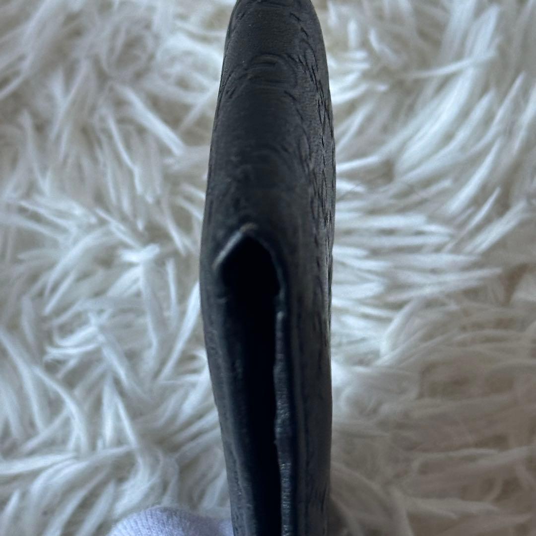 グッチ GGシマ 二つ折り財布 型押し レザー コンパクト 黒 総柄 エンボス