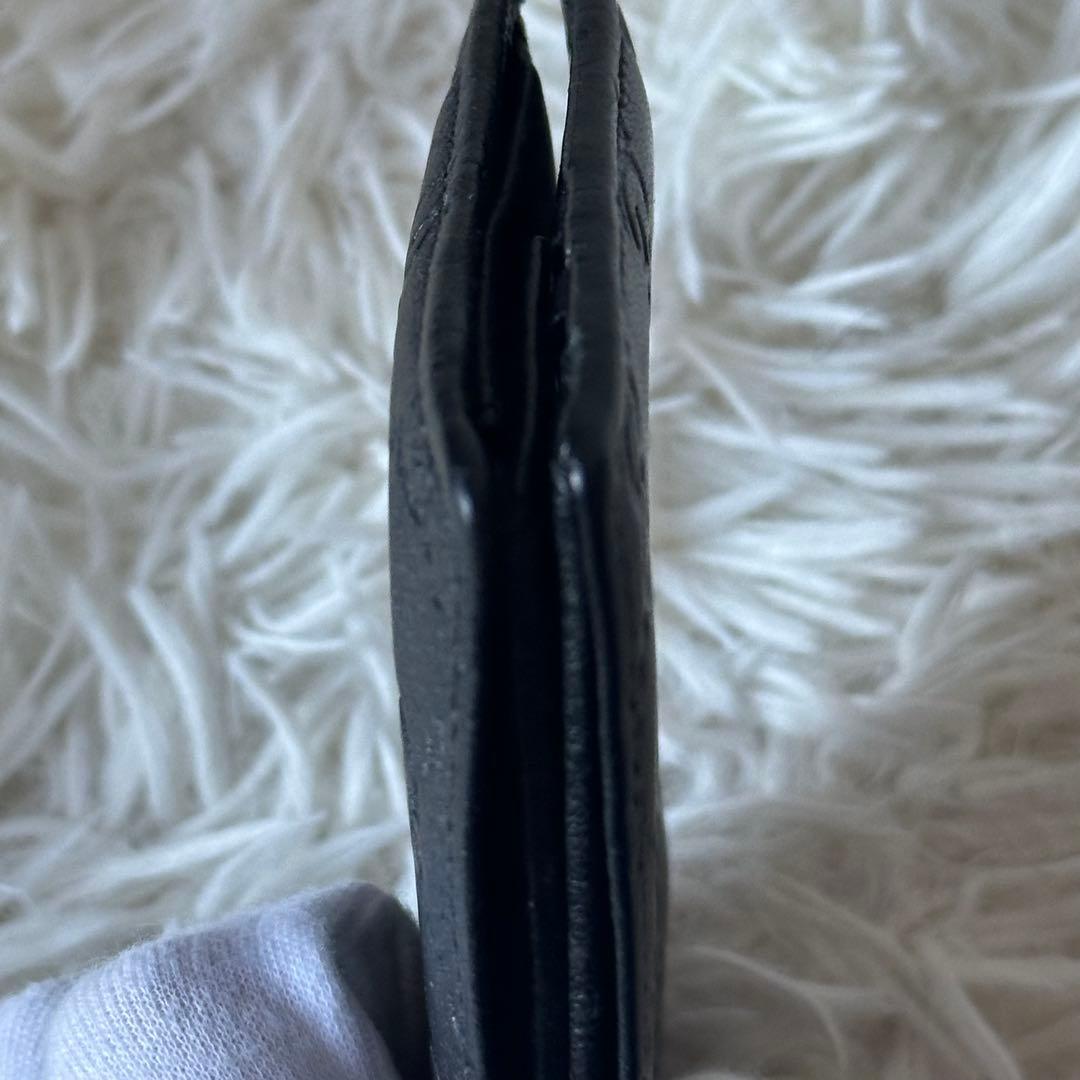 グッチ GGシマ 二つ折り財布 型押し レザー コンパクト 黒 総柄 エンボス