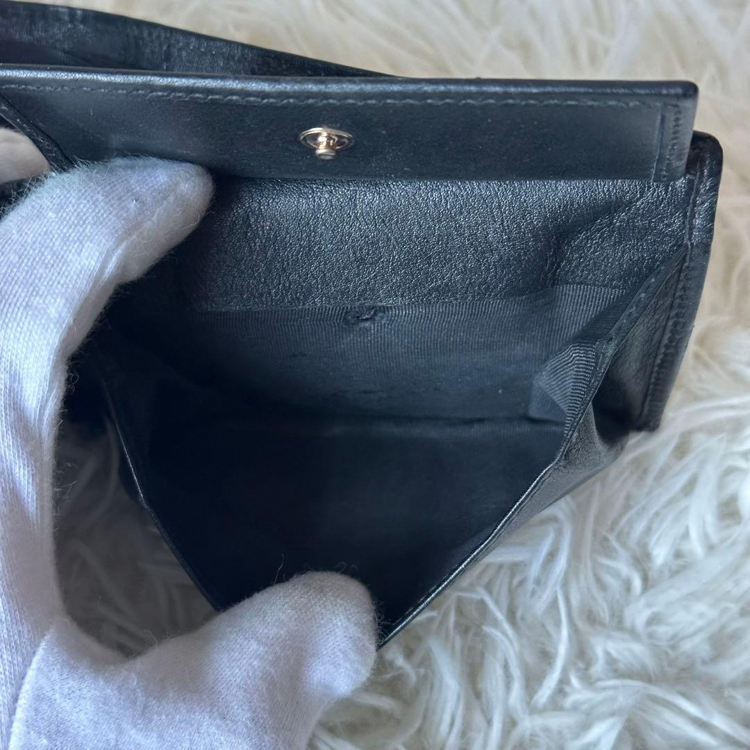 グッチ GGシマ 二つ折り財布 型押し レザー コンパクト 黒 総柄 エンボス