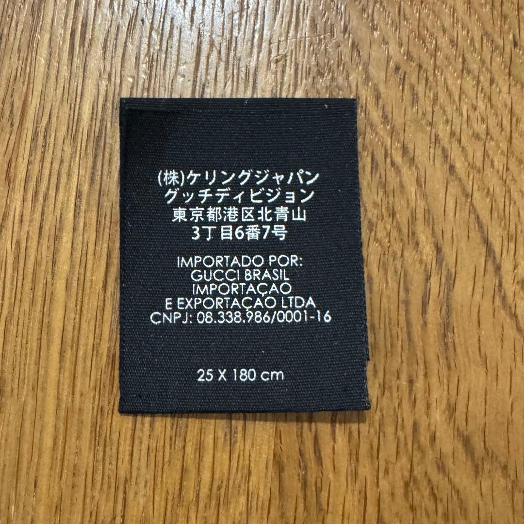 GUCCI ブラック マフラー エンボスロゴ