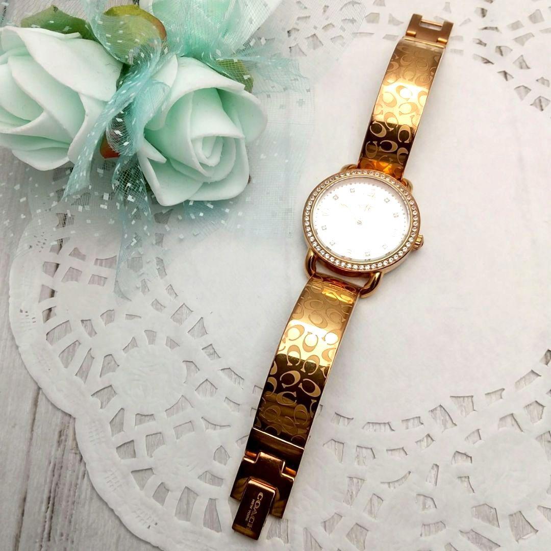 稼働品 美品 コーチ バングル腕時計 レディース ストーン付き 馬車ロゴ