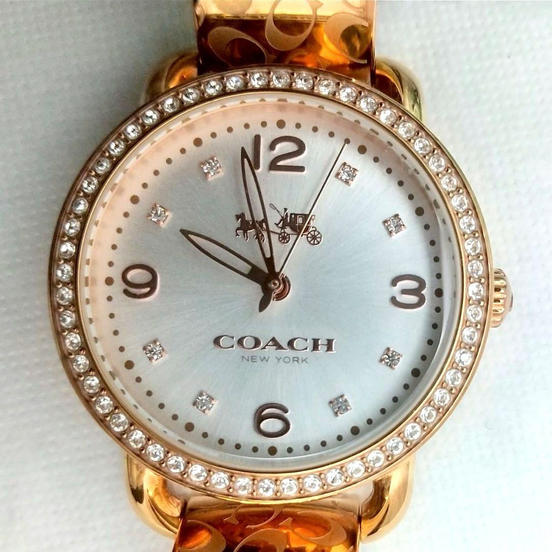 稼働品 美品 コーチ バングル腕時計 レディース ストーン付き 馬車ロゴ