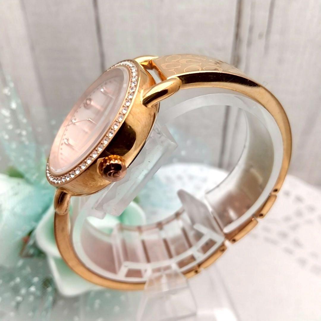 稼働品 美品 コーチ バングル腕時計 レディース ストーン付き 馬車ロゴ