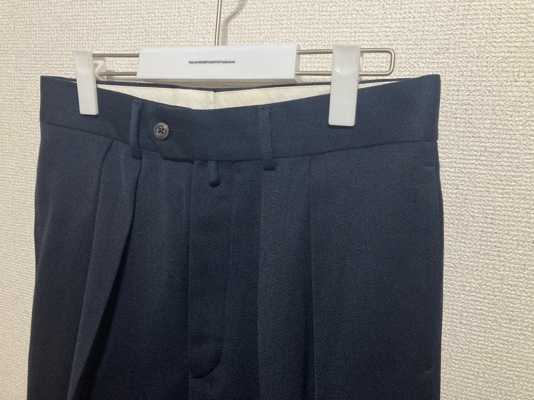 NEAT ウール ネイビー テーパードスラックス