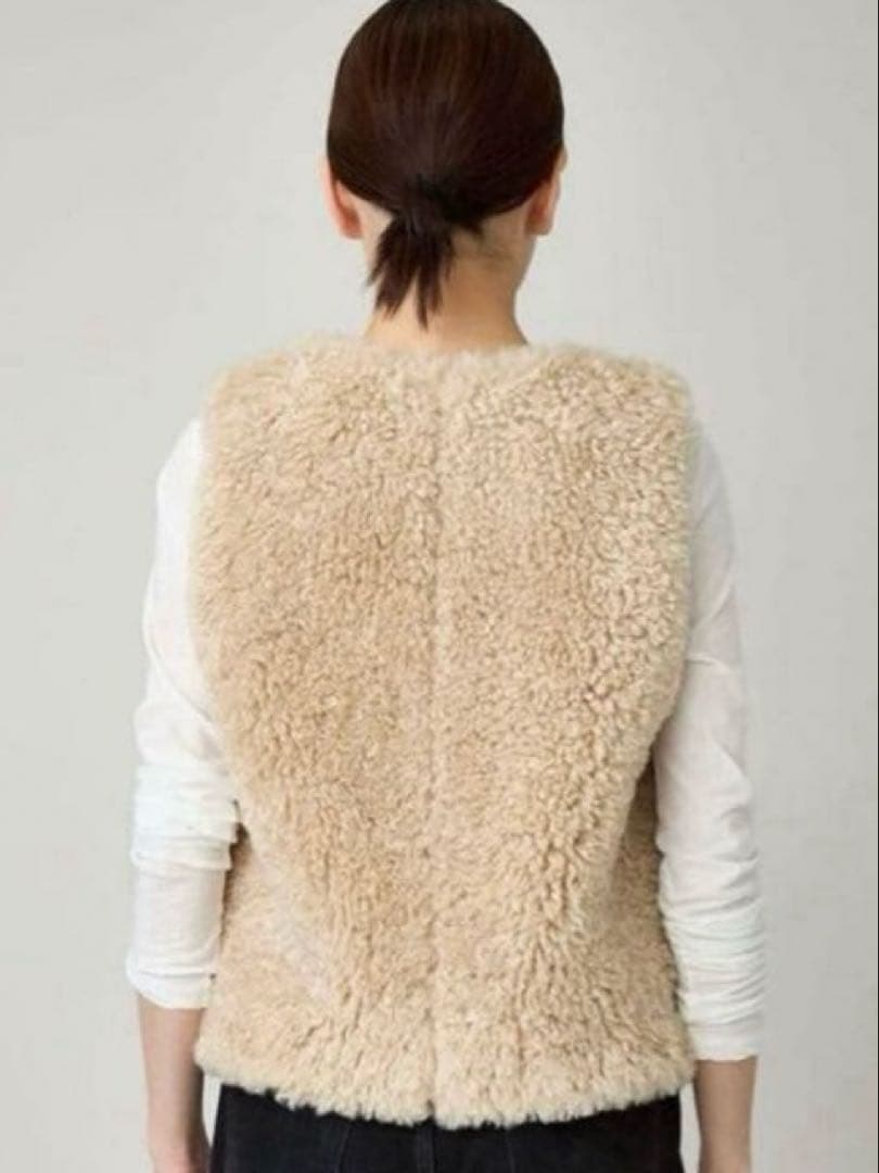 美品カレンソロジーCurensologカーリーショートベスト