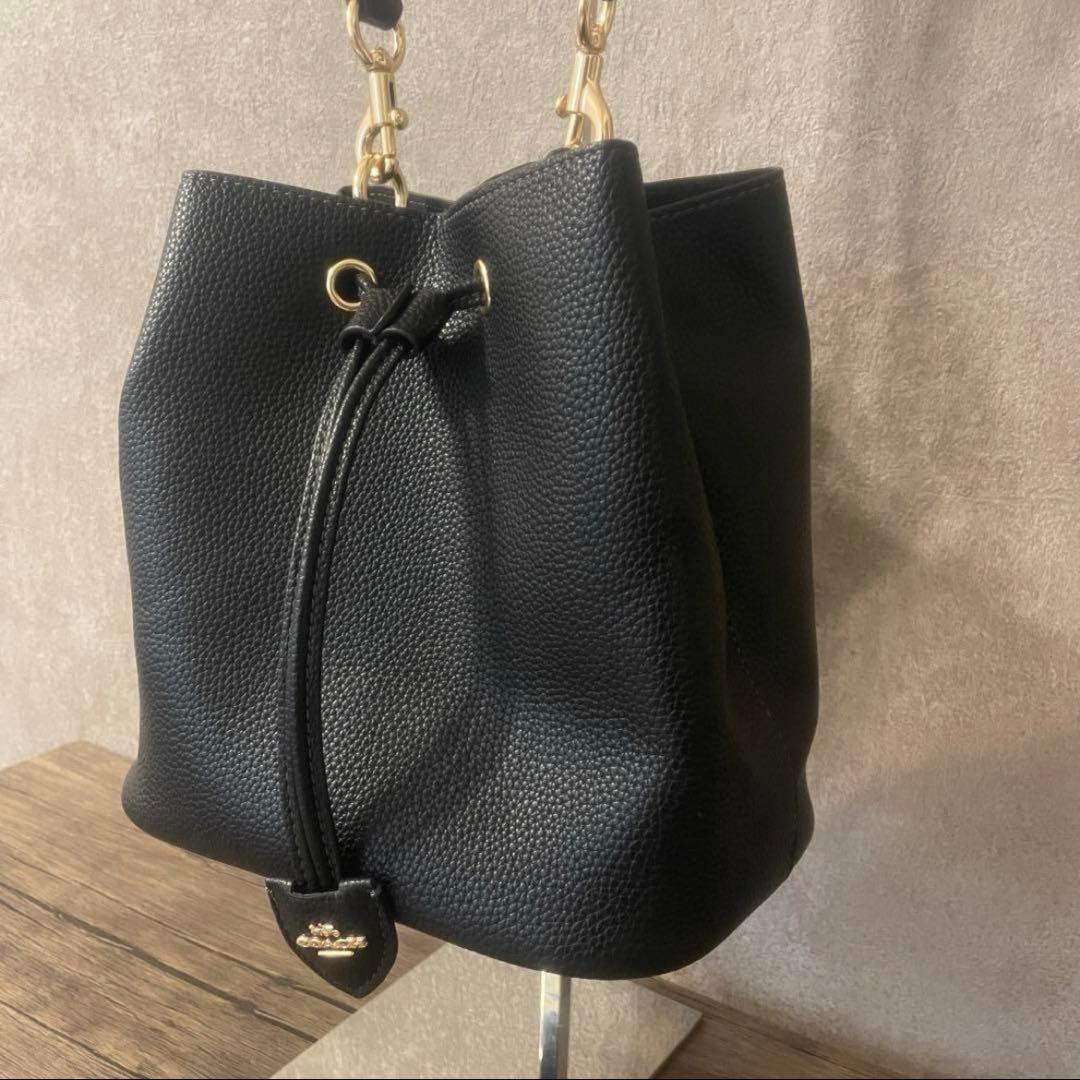 コーチ シグネチャー ローアン バケット バッグ ブラウン キャンバス @