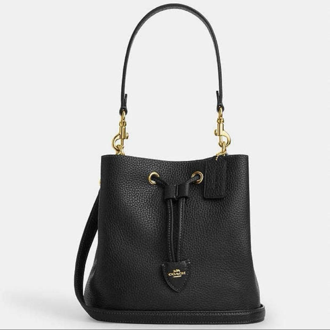 コーチ シグネチャー ローアン バケット バッグ ブラウン キャンバス @