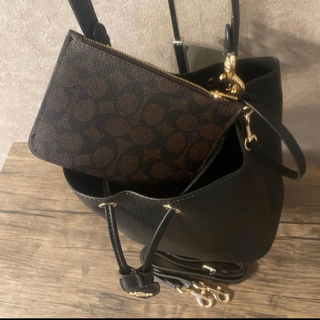 コーチ シグネチャー ローアン バケット バッグ ブラウン キャンバス @