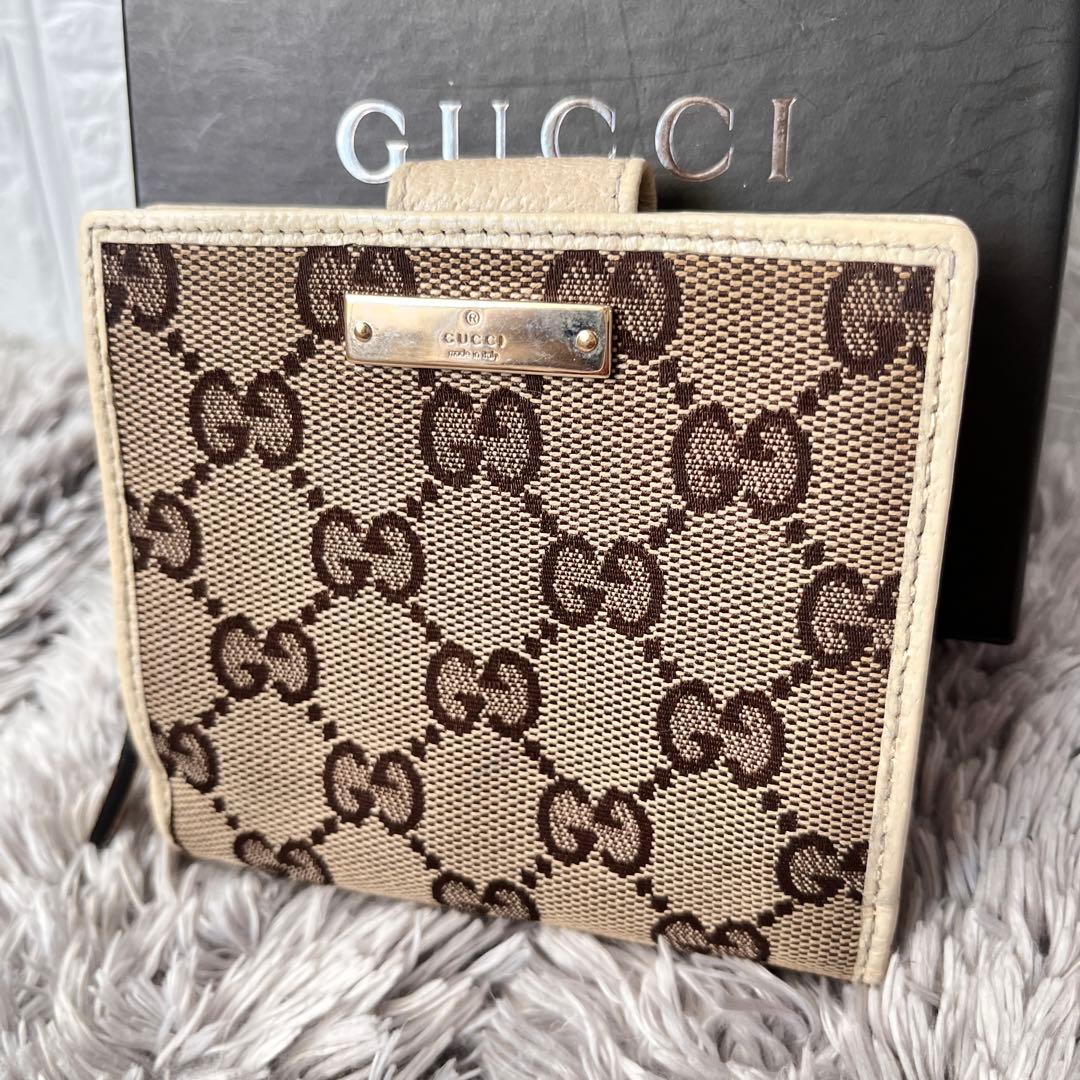 GUCCI 折り財布　GGキャンバス ホワイト　ロゴプレート　メンズ　レディース