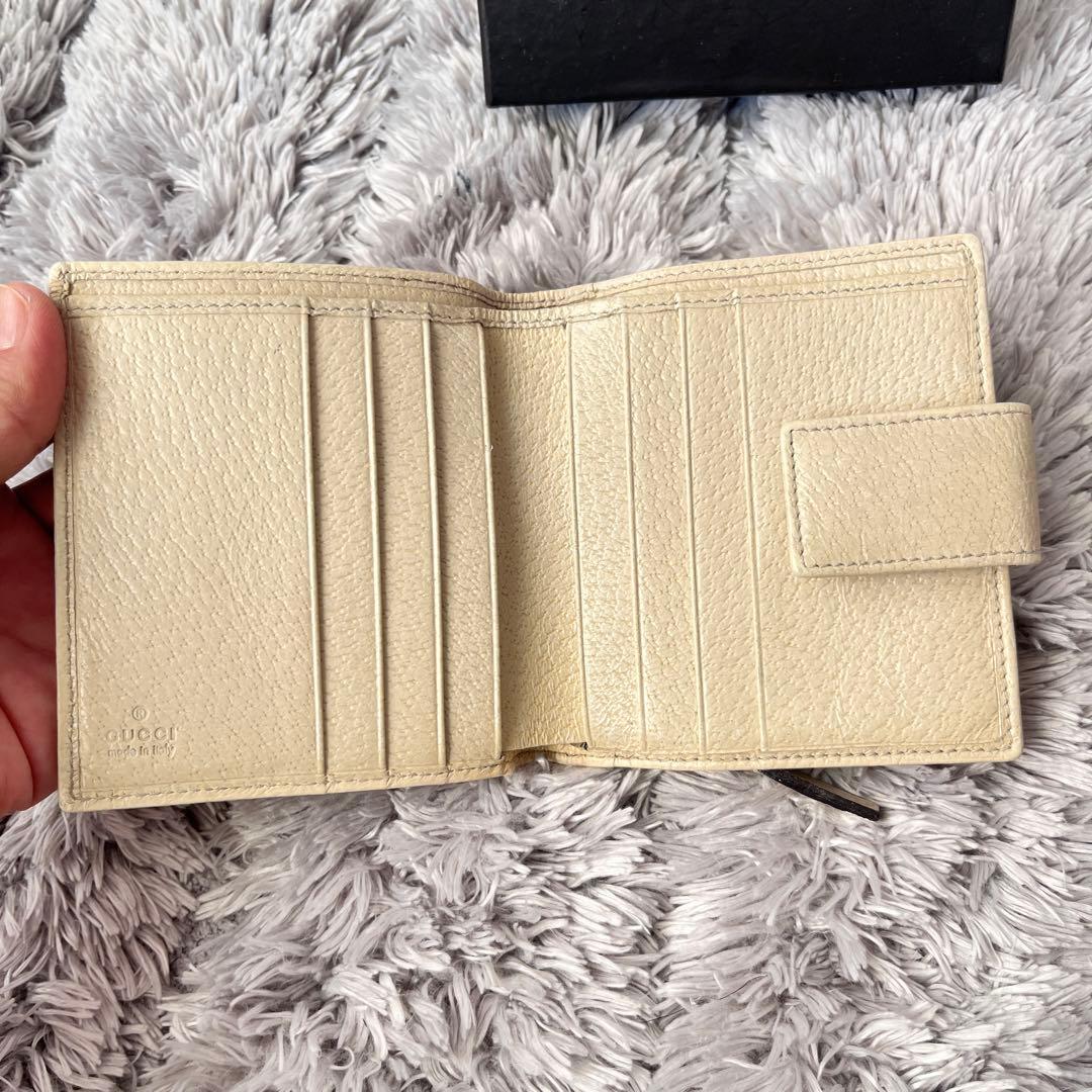 GUCCI 折り財布　GGキャンバス ホワイト　ロゴプレート　メンズ　レディース