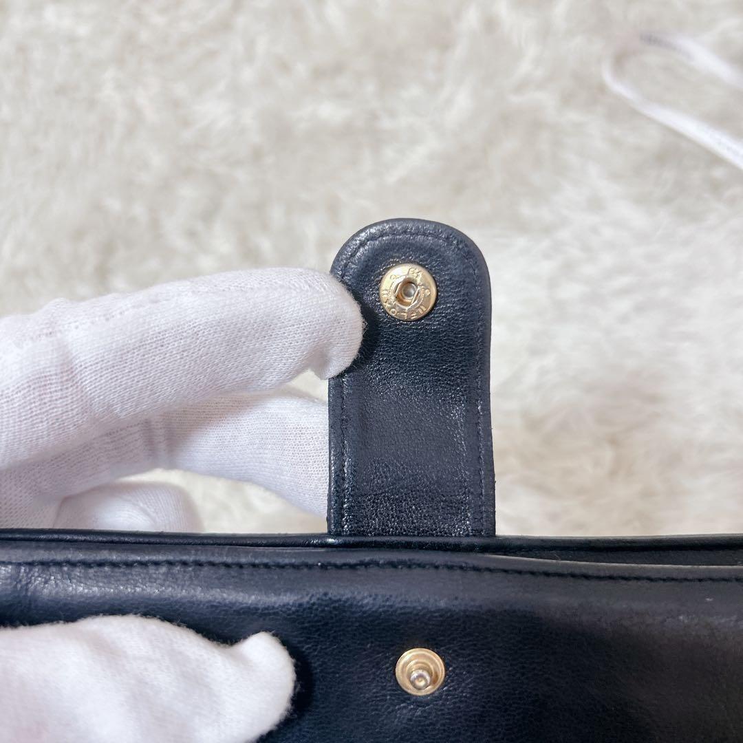 CHANEL ココマーク　ロゴエンボス レザー　長財布　がま口　ゴールド　黒