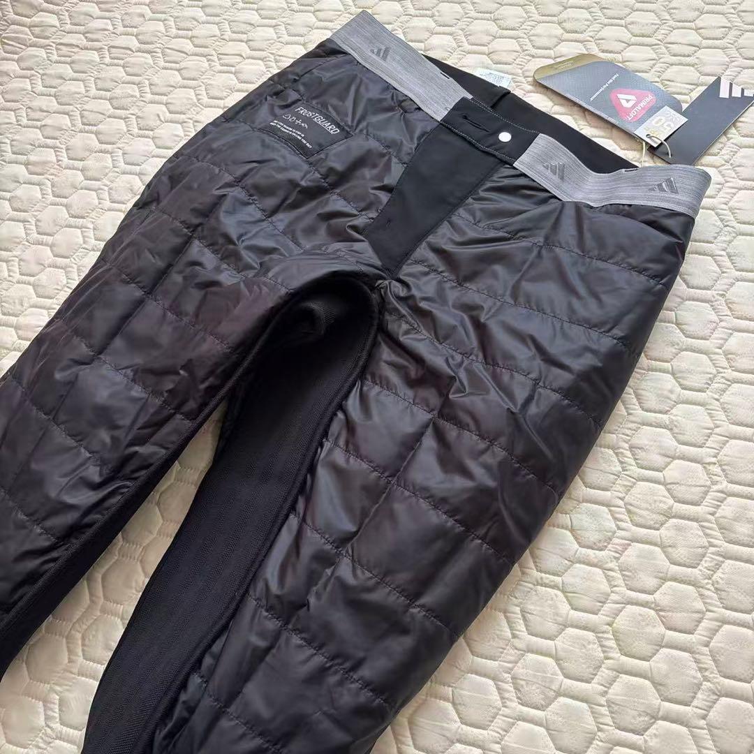 85新品27500円アディダスゴルフ/メンズ/秋冬/中綿ストレッチパンツ/黒