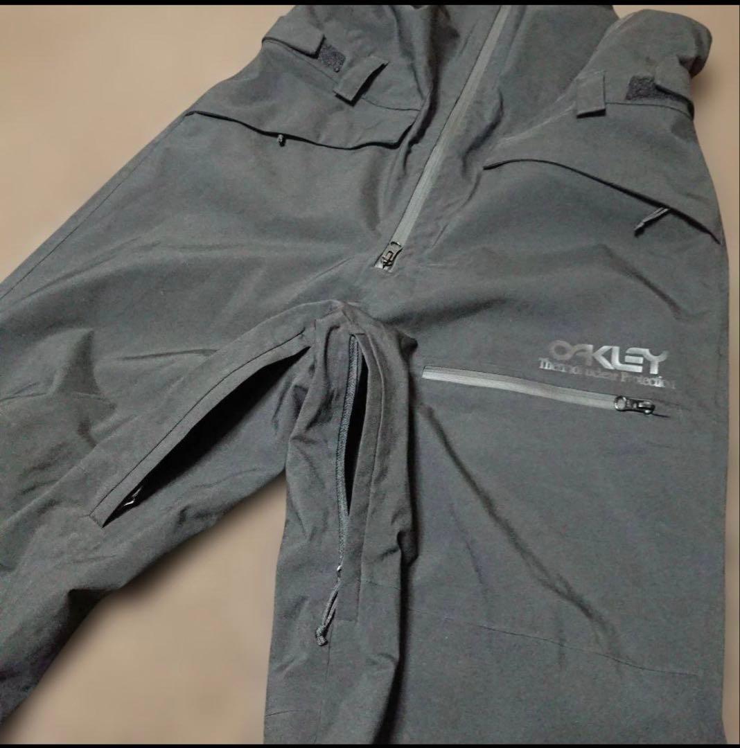 送料無料【OAKLEY】ブラック無地ビブパンツ L スノボやスキーに