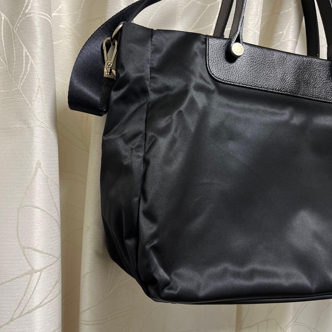 超美品ラシット今期A4入るポケット多数三層構造メタルロゴ2wayバッグ